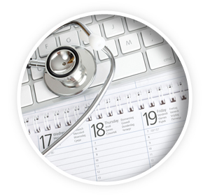 Stethoscope on keyboard and calendar